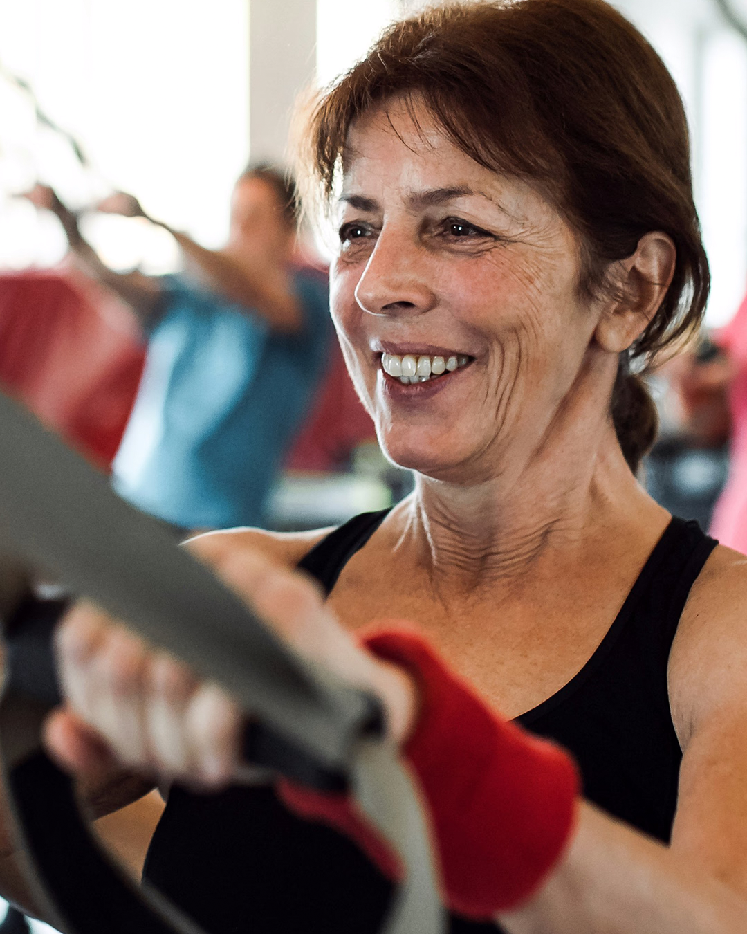 Female at the gym with happy expression