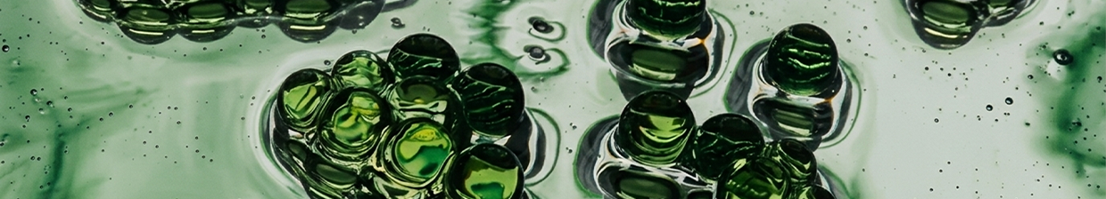 Close up of particles with a green tint