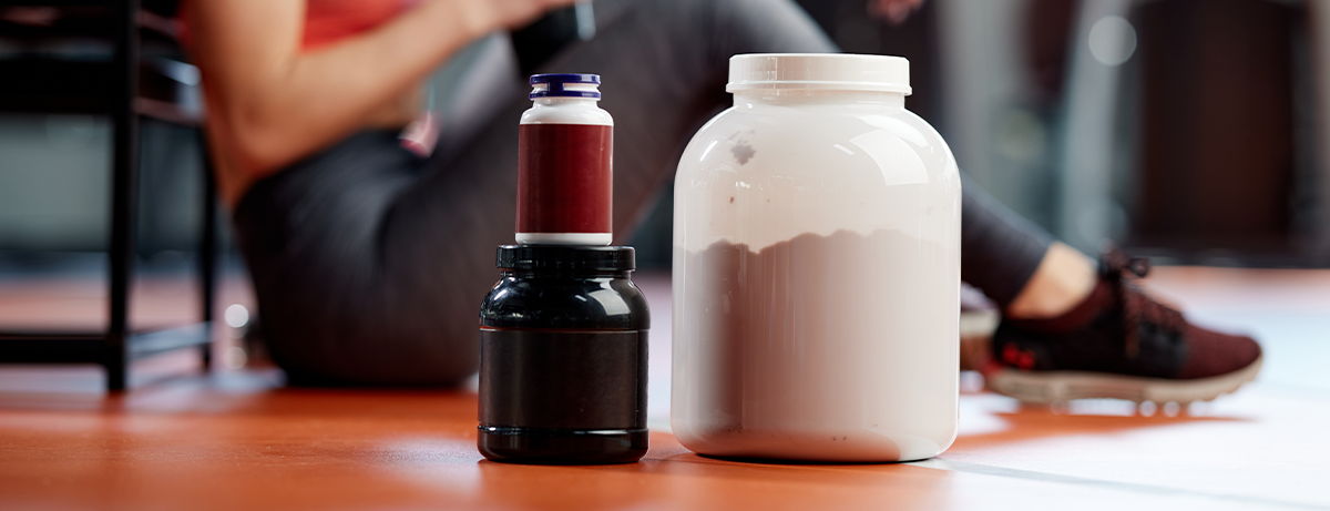 Protein shake on the floor at the gym