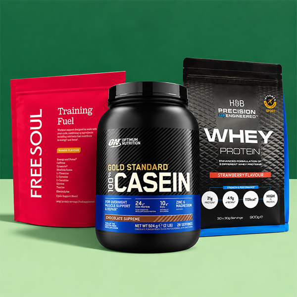Selection of protein powders on green background