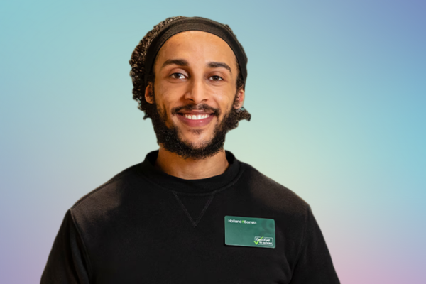 Store colleague smiling at camera