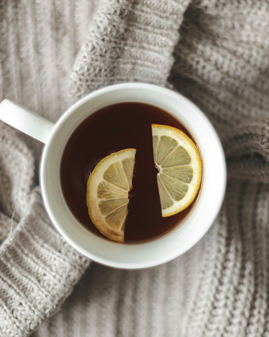 lemon immunity tea on cardigan