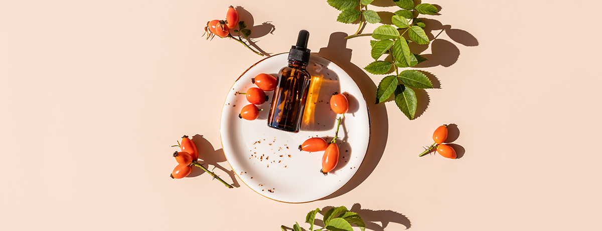 rosehip oil on a pink background