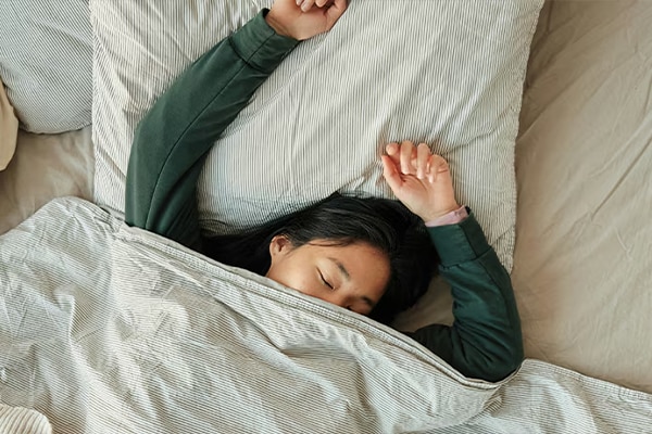 Female in bed sleeping