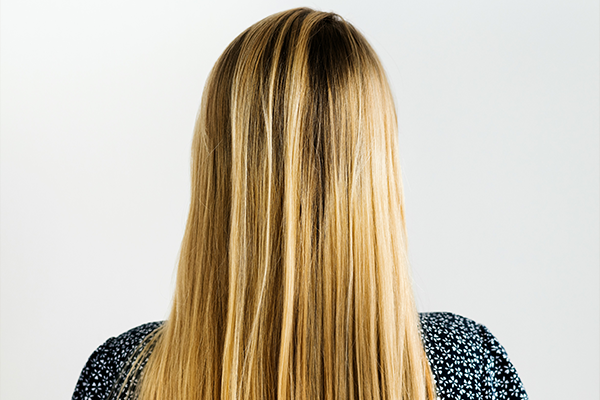 Female with straight hair, back to the camera