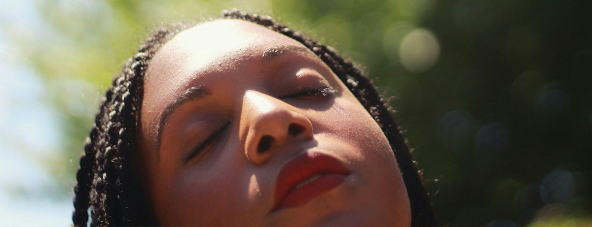 Female outdoors in the sun