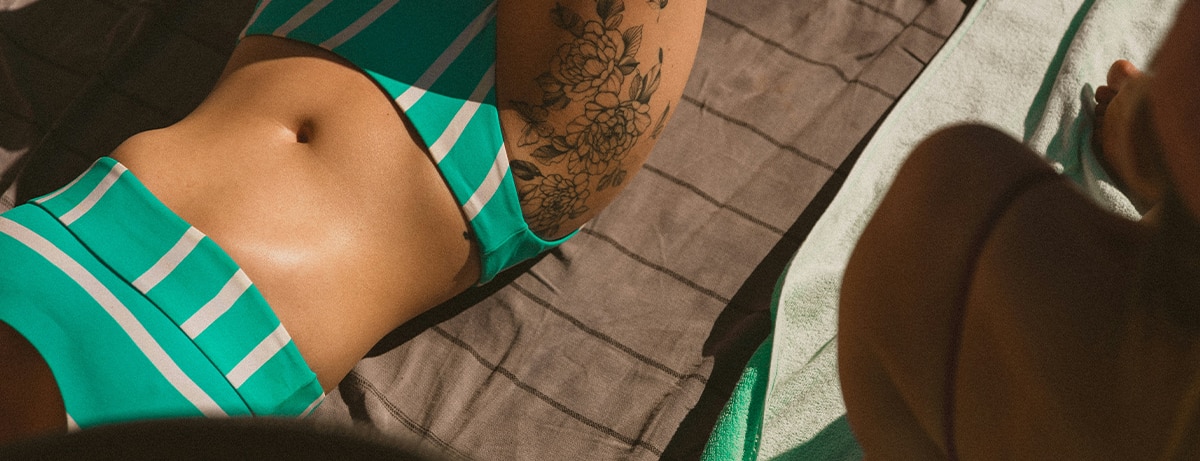 Female close up laying out in the sun