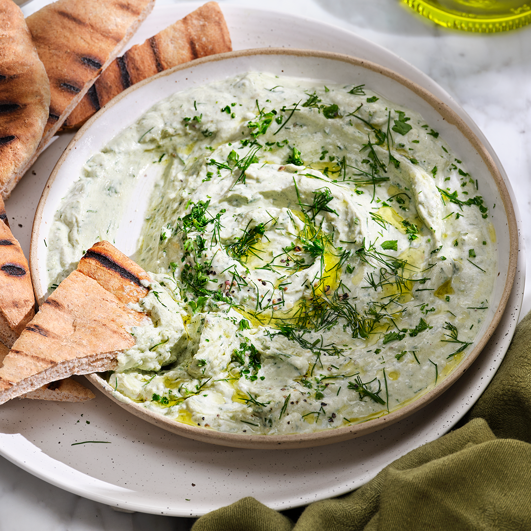 Green dip in a white bowl