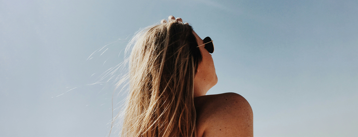Female looking at the sun