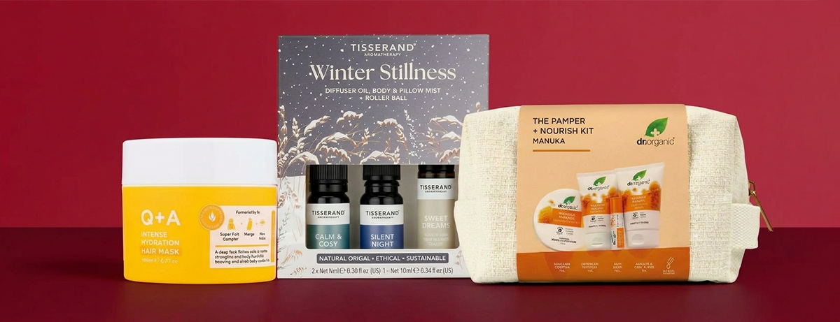 Selection of winter gifts on red background
